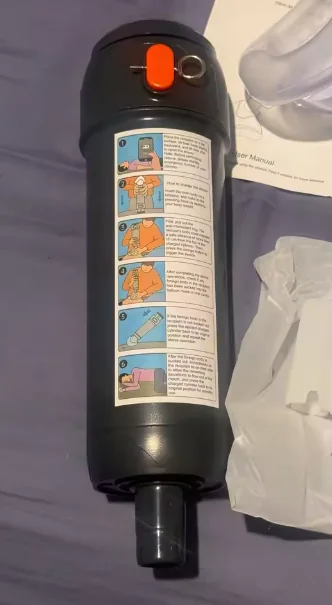 Customer-submitted close-up photo of the suction device body and instruction label