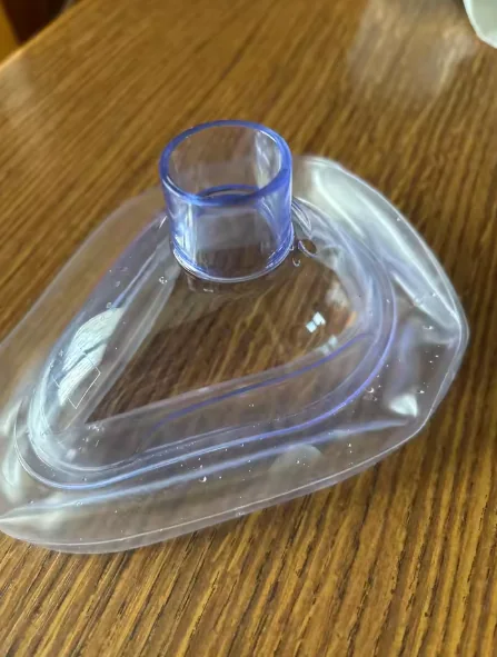 Customer-submitted close-up photo of a clear mask and connector